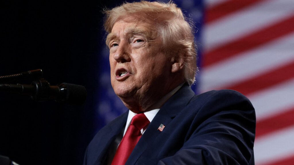U.S. President Donald Trump delivers remarks at Red Rock Casino Resort Spa in Las Vegas, Nevada, U.S., August 5, 2026. It is a head-and-shoulders shot and he is wearing a blue jacket and shiny red tie.