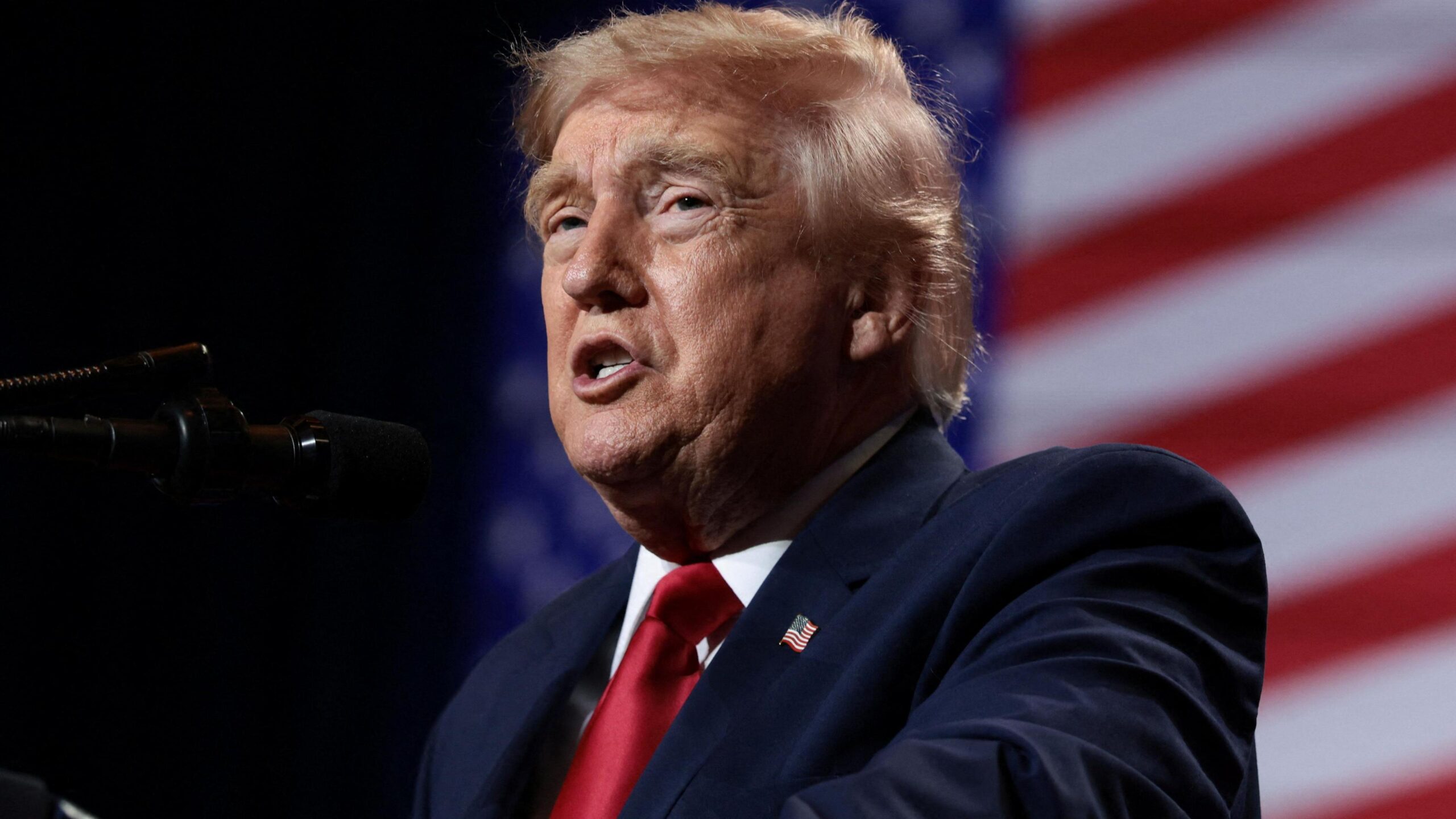U.S. President Donald Trump delivers remarks at Red Rock Casino Resort Spa in Las Vegas, Nevada, U.S., August 5, 2026. It is a head-and-shoulders shot and he is wearing a blue jacket and shiny red tie.