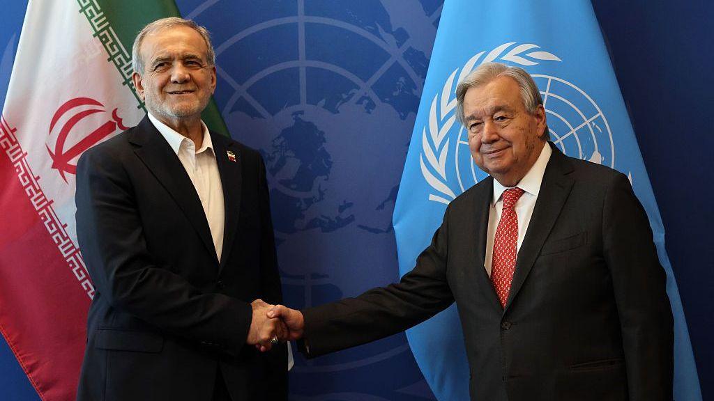 Iranian President Masoud Pezeshkian (L) shakes hands with the UN Secretary General Antonio Guterres at last year's assembly
