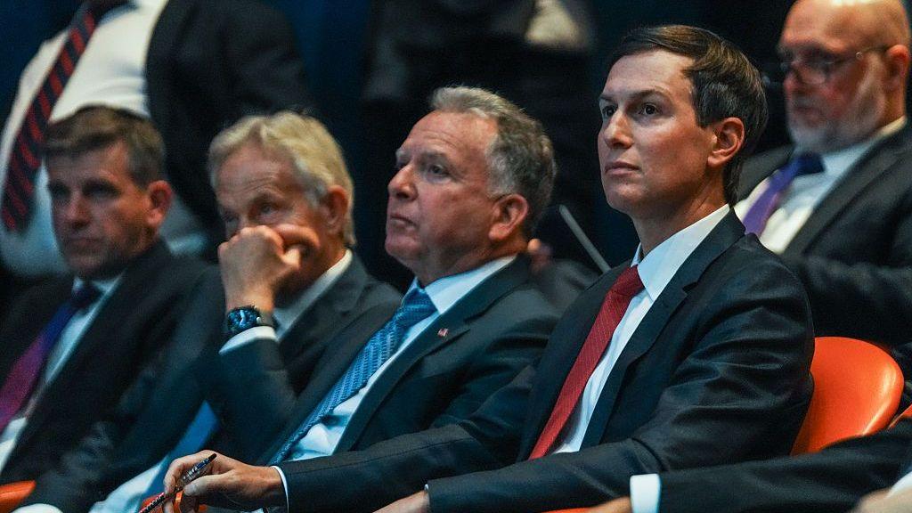 Tony Blair, Steve Witkoff, and Jared Kushner watching a presentation during a Board of Peace briefing