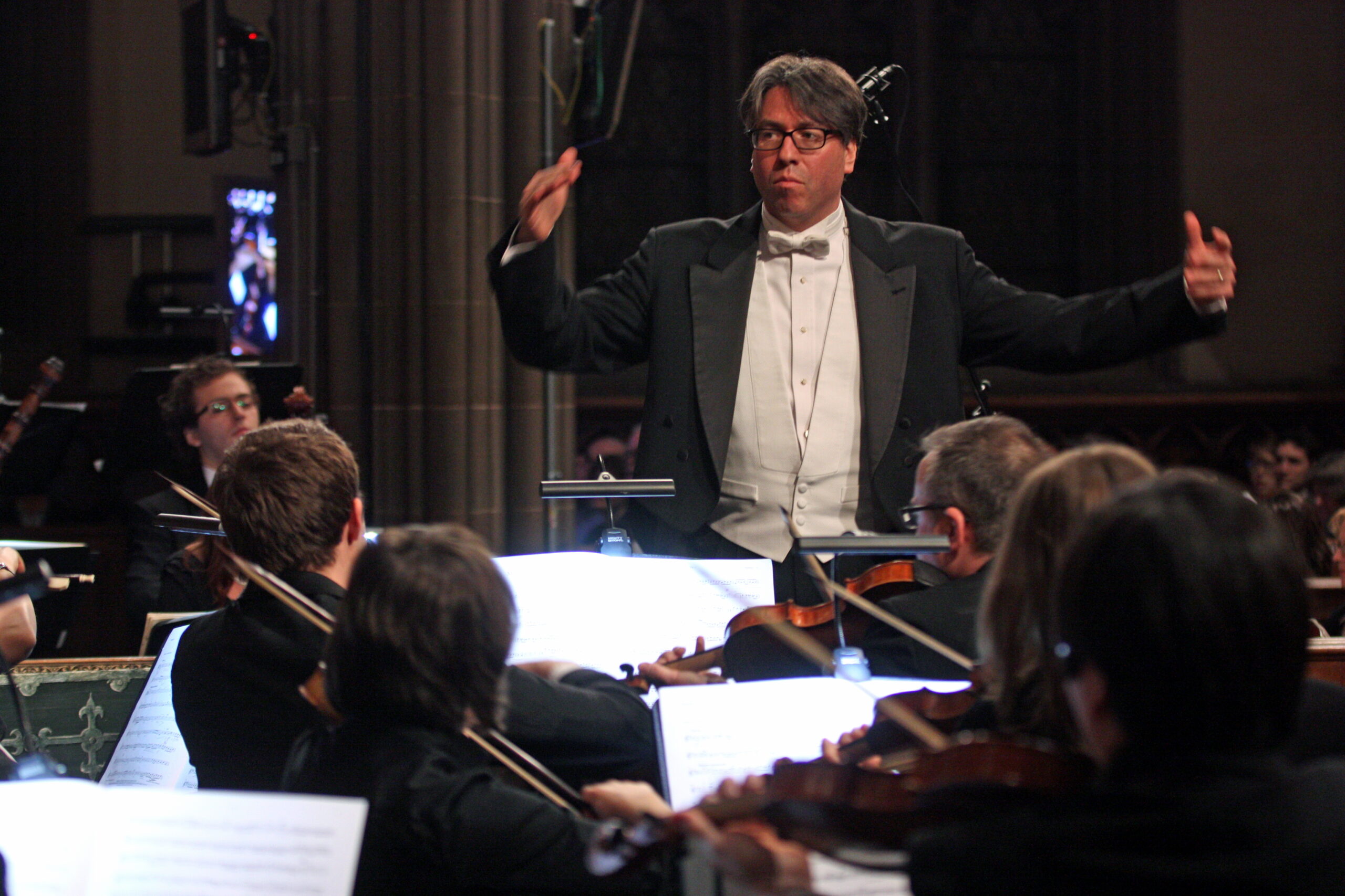 Julian Wachner conducting the Choir of Trinity Wall Street with the Trinity Baroque Orchestra in 2013.