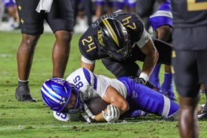 Sep 19, 2026; Orlando, Florida, USA; Georgia State Panthers tight end Grant Hollier (85) is tackled by UCF Knights linebacker Tackett Curtis (24) during the second quarter at Acrisure Bounce House. Mandatory Credit: Mike Watters-Imagn Images