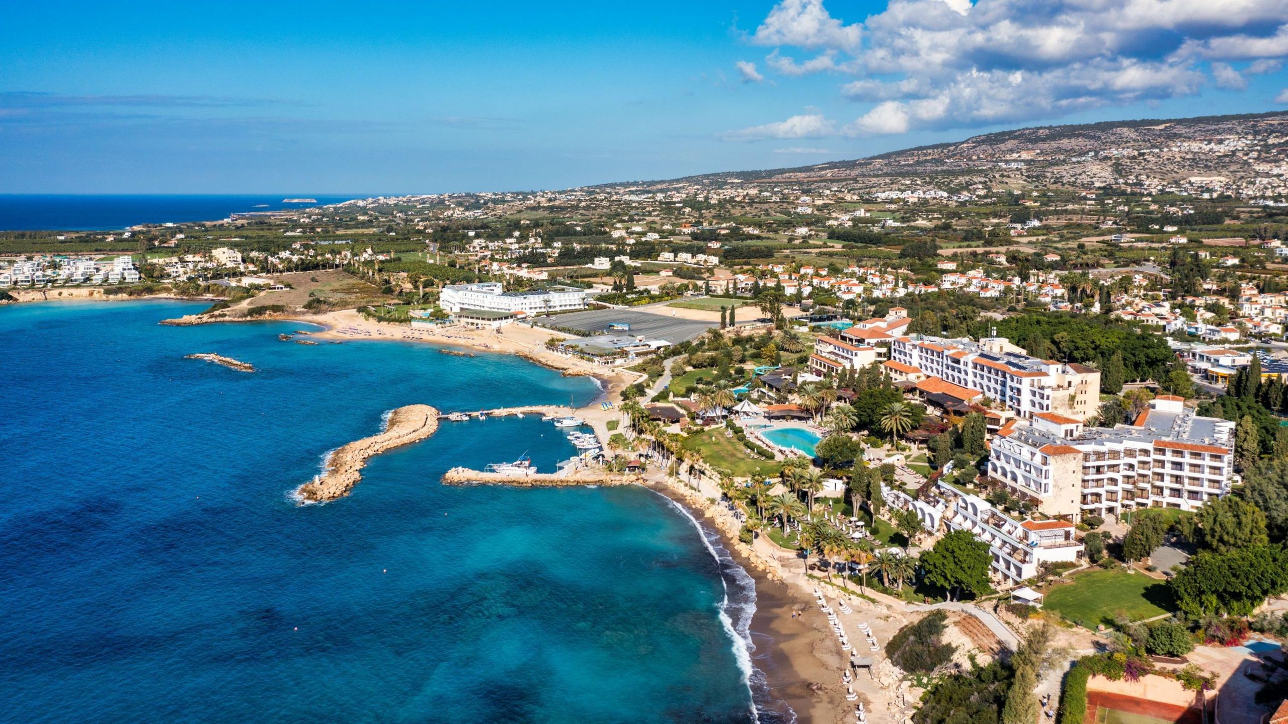 Aerial panoramic view of Coral bay beach, Cyprus. Overhead view of Coral Bay beach, Peyia village, Paphos district, Cyprus. Aerial view of Coral Bay beach in Peyia village, Cyprus.