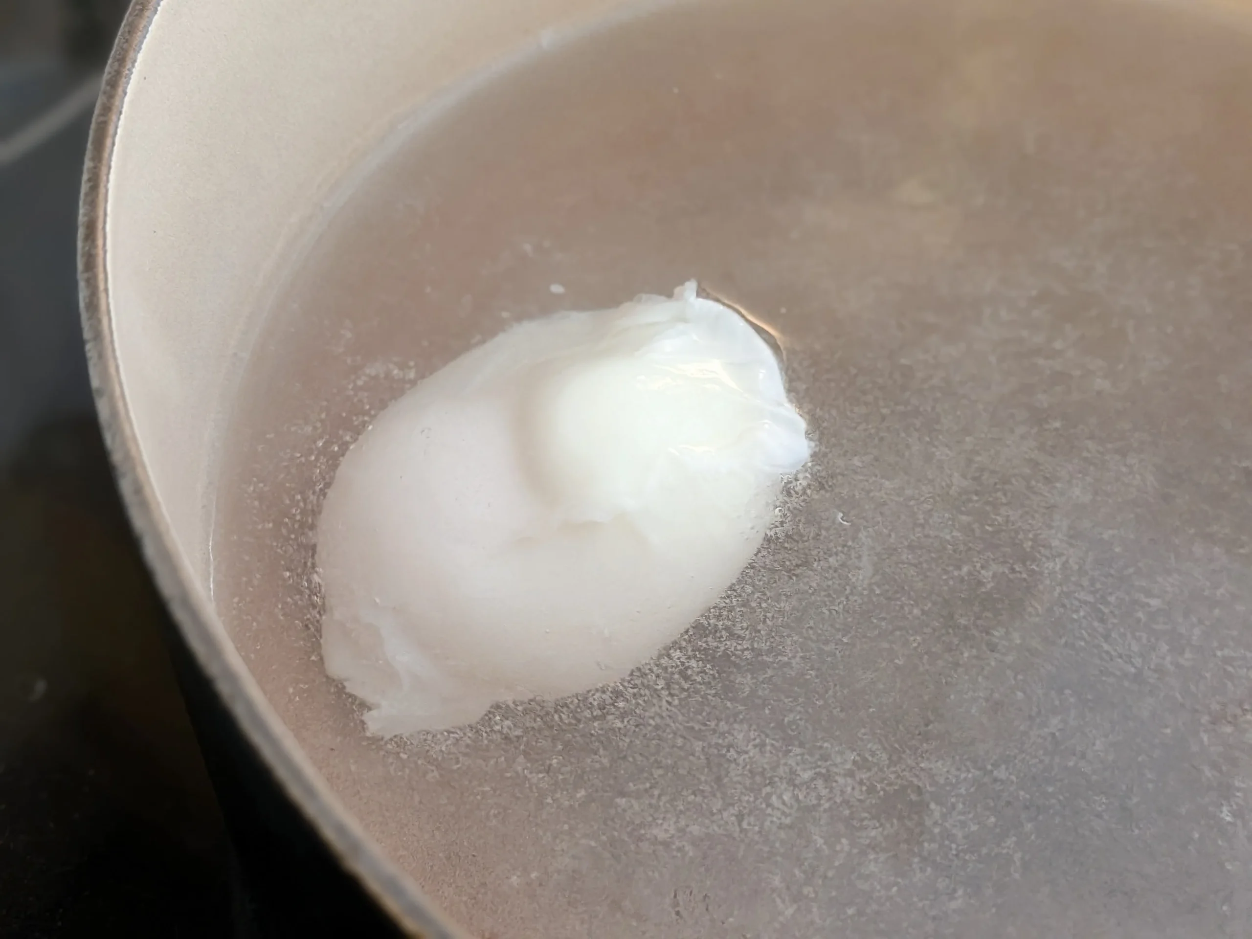 Strained egg simmering like a tidy package