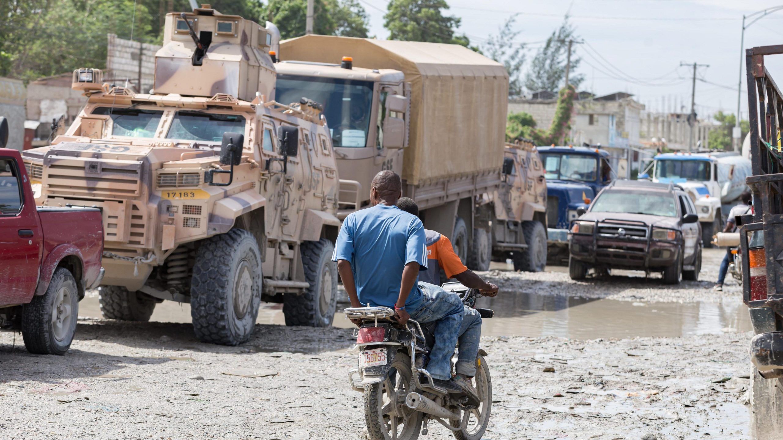 Gang Suppression Force (GSF) vehicles are seen in a traffic jam in downtown Port-au-Prince, Haiti, on October 24, 2026. Approximately 450 Salvadoran soldiers have arrived in the Haitian capital to reinforce the GSF and take part in search operations for four missing Salvadoran nationals.