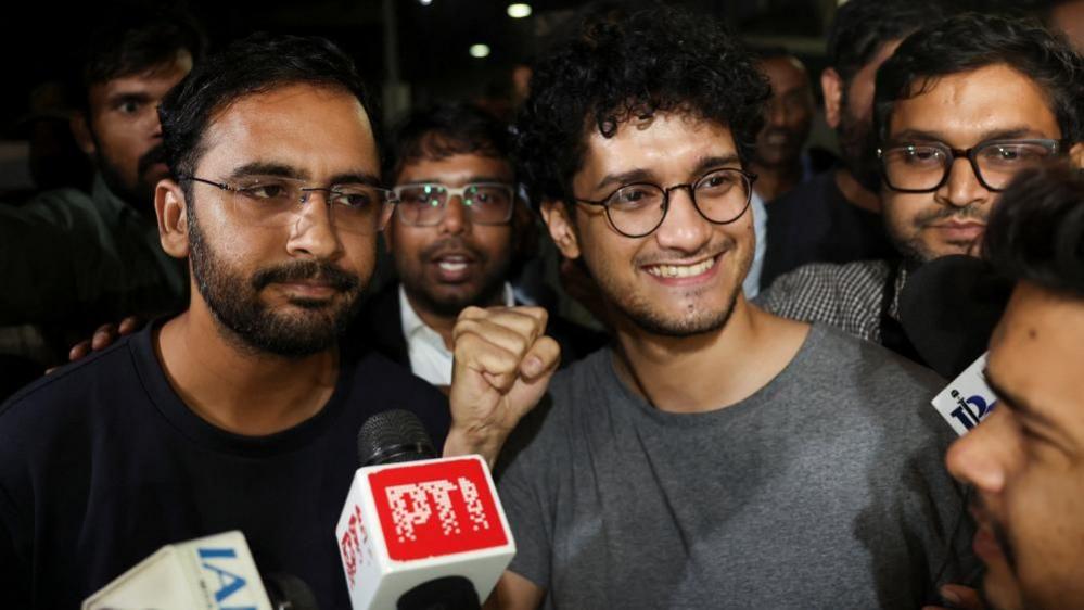 Saurav Das, chief spokesperson of the Cockroach Janta Party (CJP), and Ashutosh Ranka, CJP co-convenor, speak to the media after being released following a hearing before a Special Executive Magistrate, in New Delhi, India, October 21, 2026. REUTERS/Bhawika Chhabra