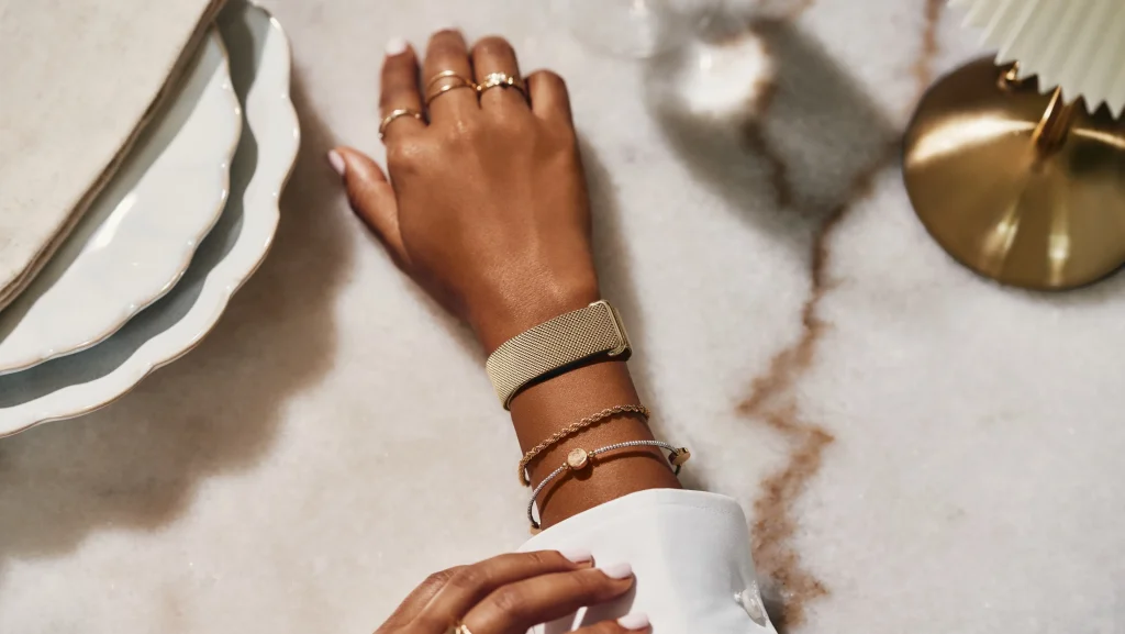 Fitbit air metal mesh gold dinner lifestyle
