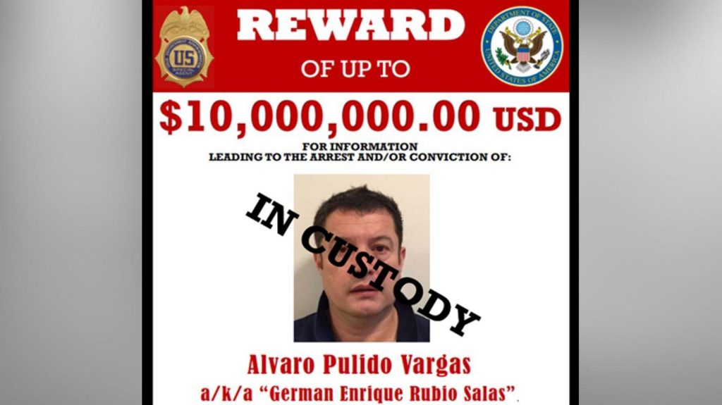 A poster issued by the DEA and the US state department shows a photo of Alvaro Pulido wearing a black polo shirt. His name appears underneath his photo. The poster says that he was also known as German Enrique Rubio Salas. The poster offers a reward of $10m for information leading to his arrest and/or conviction.