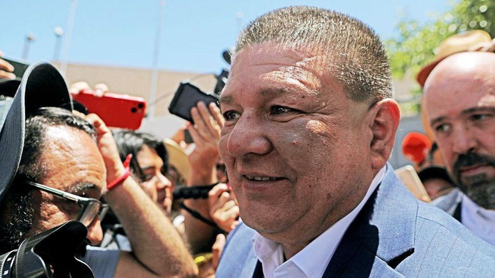 Former Chihuahua Prosecutor Cesar Jauregui, who has short brown hair and wears a suit, is pictured during a rally in support of the Governor of Chihuahua, Maru Campos, outside the Attorney General's Office (FGR) in Ciudad Juarez, Chihuahua, Mexico, in May
